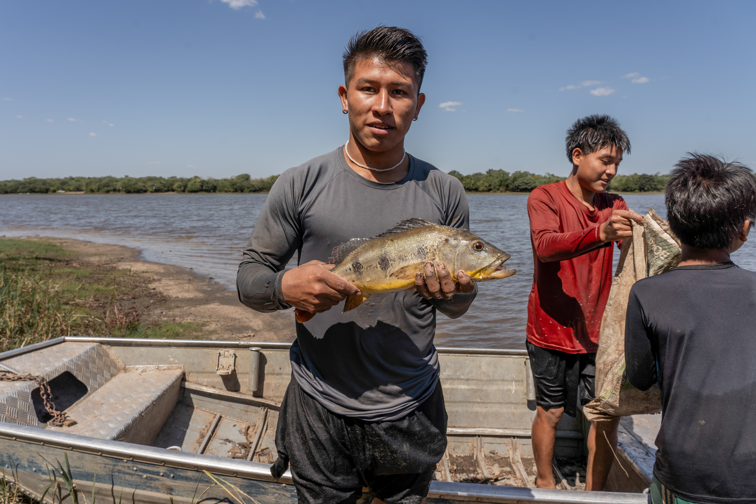 A man with a fish in his hands