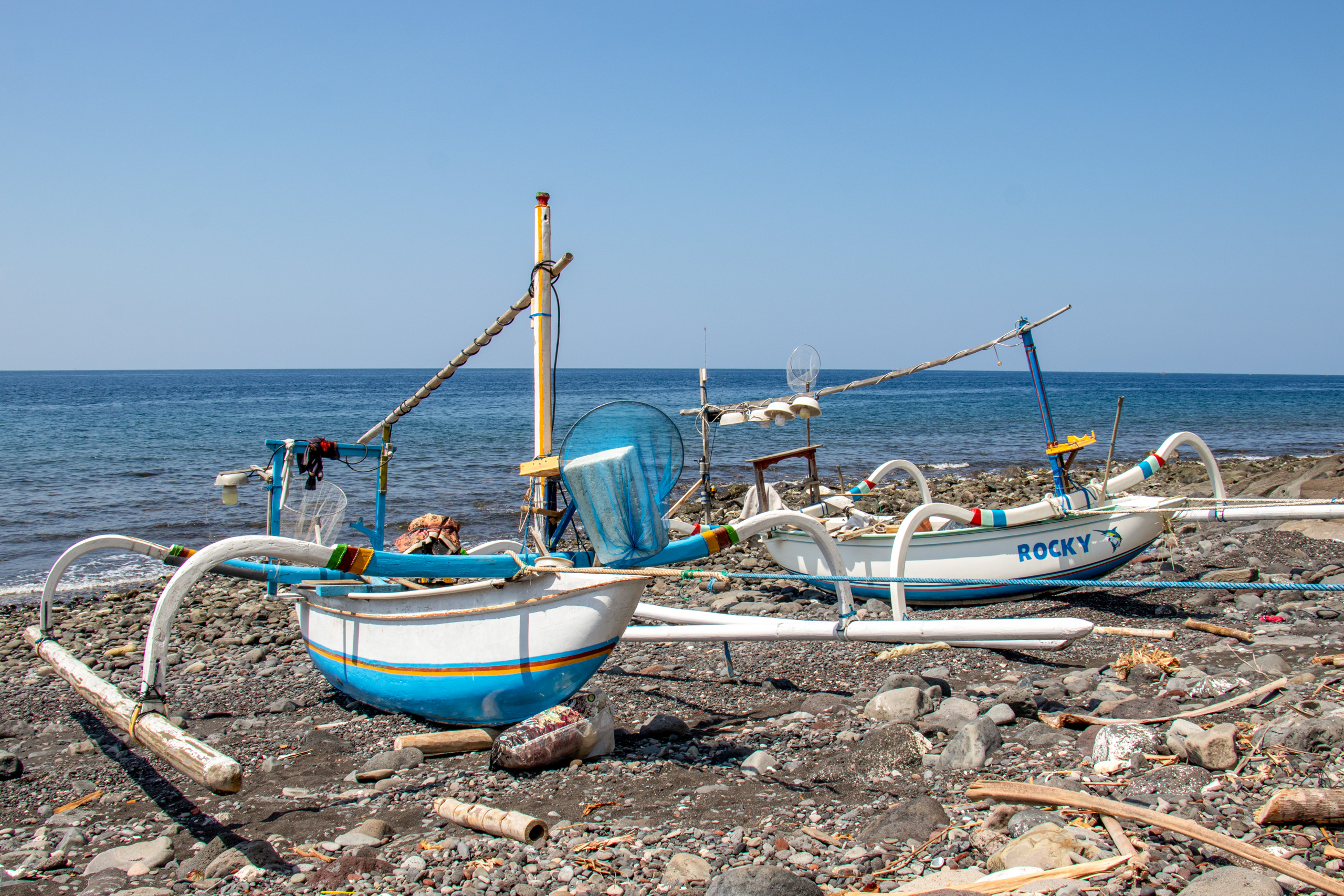 Traditional Balinese fishing boats on shore